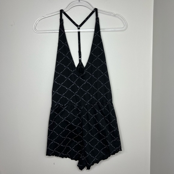 Missguided Pants - NWT - Missguided lettuce hem, low v cut romper teddy. Black - size 8. Brand new!
